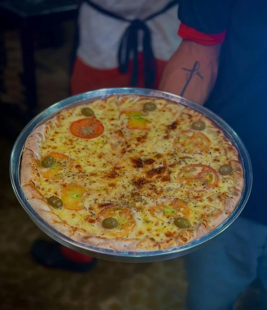 Faça seu pedido na Pizzaria O Gordinho e saboreie as melhores pizzas de Pedro II!